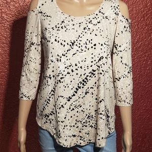 jm collection top black and white spots on tan top. half sleeve exposed shoulder